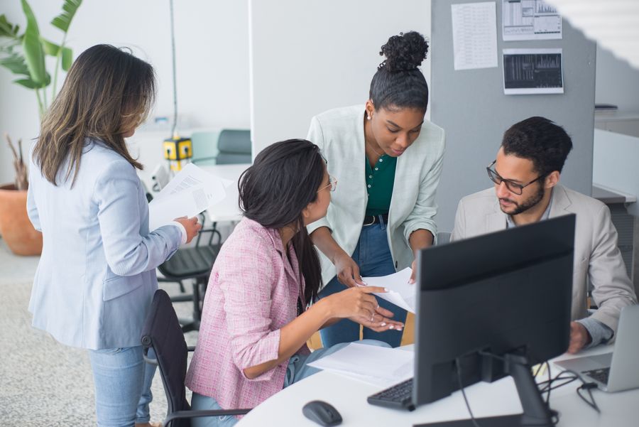 Advisory team collaborating with a client